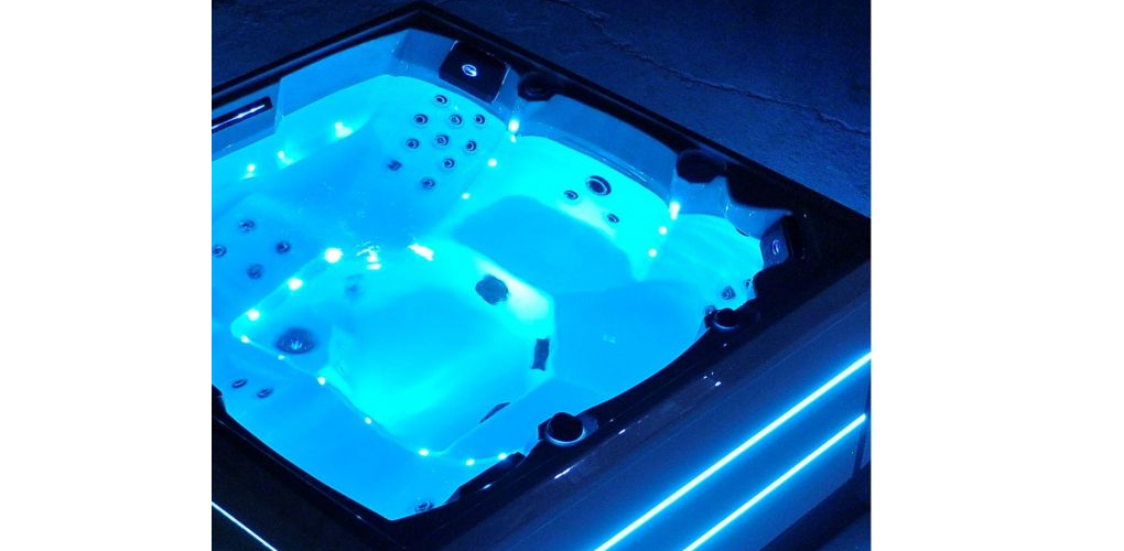 manchester hot tub lit up blue